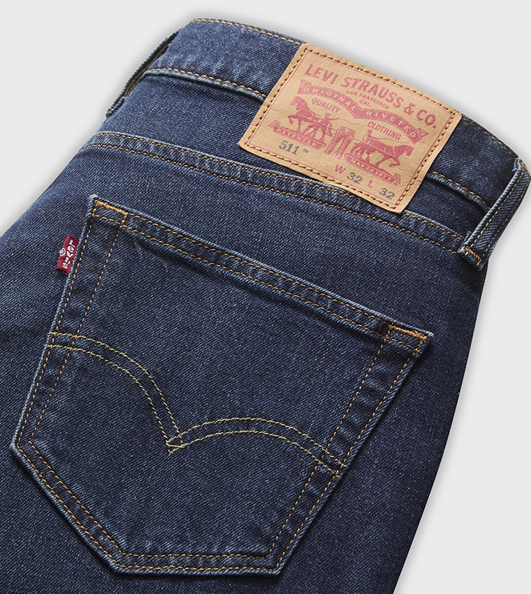 511™ Washed Mid Rise Slim Fit Jeans
