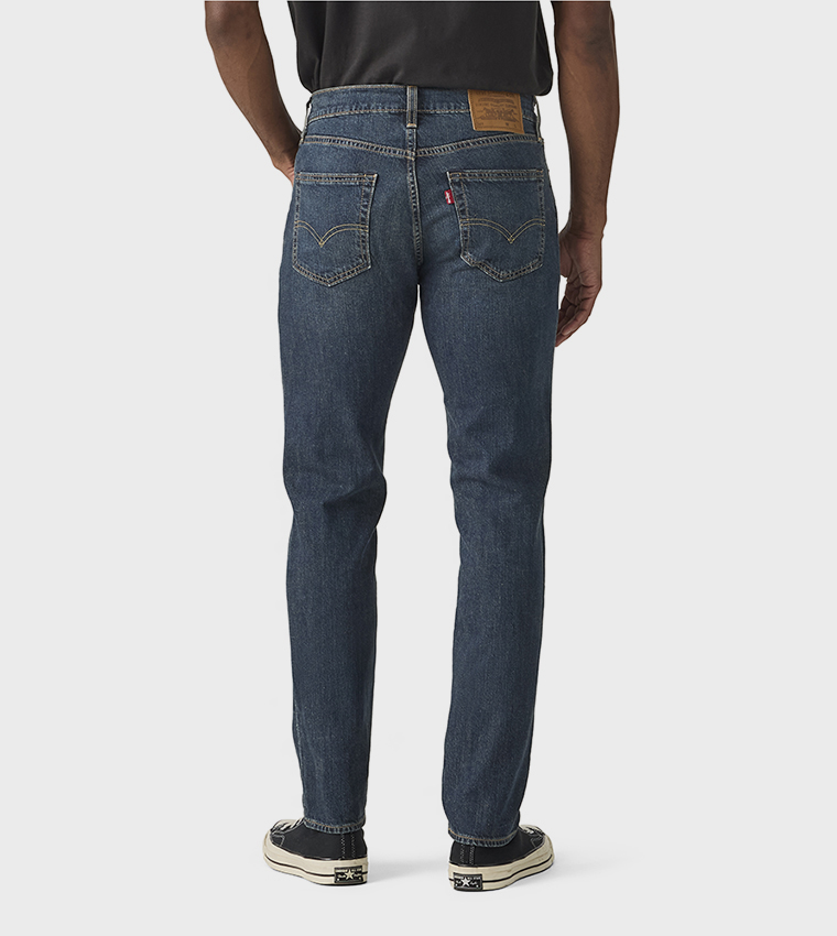 511™ Washed Mid Rise Slim Fit Jeans