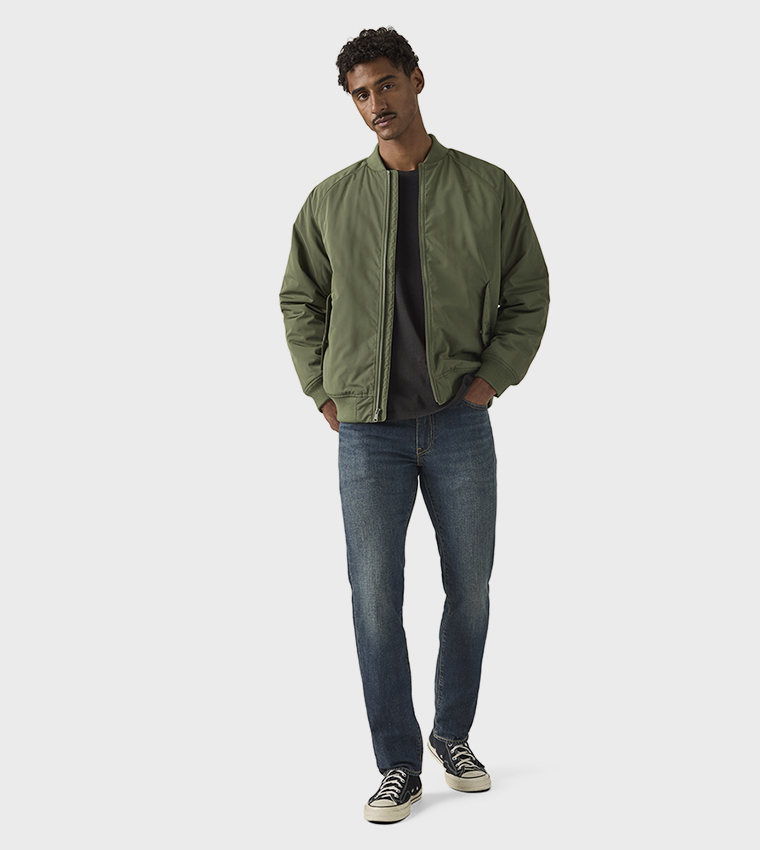511™ Washed Mid Rise Slim Fit Jeans
