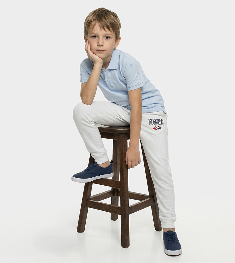 تيشيرت بولو كم قصير بشعار مطرز