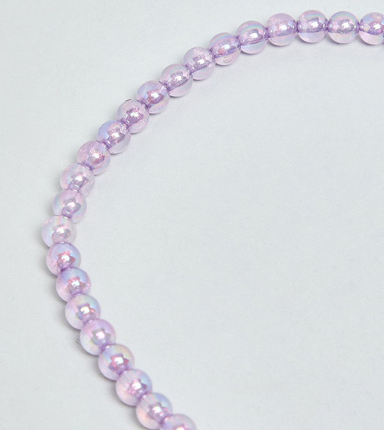 عقد خرز كورومي