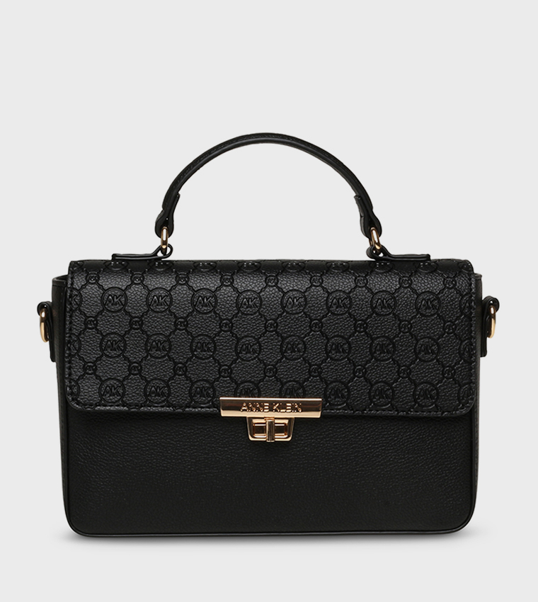 شنطة بحمالة يد وشعار 