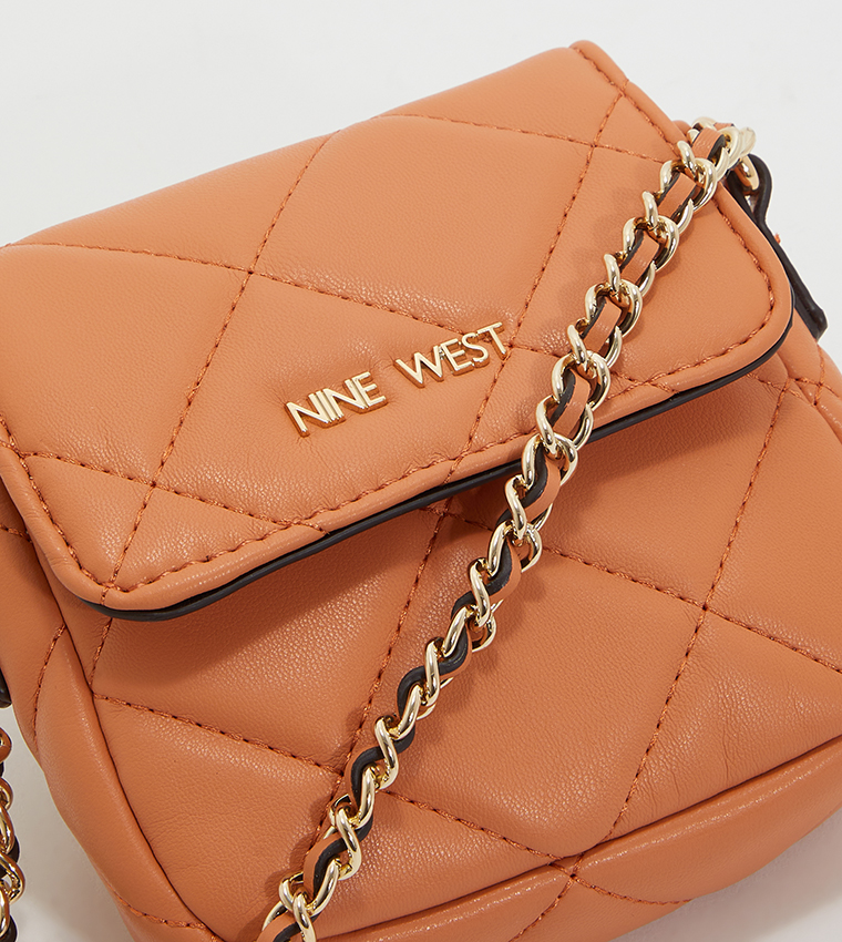 Crescent Mini Quilted Crossbody Bag