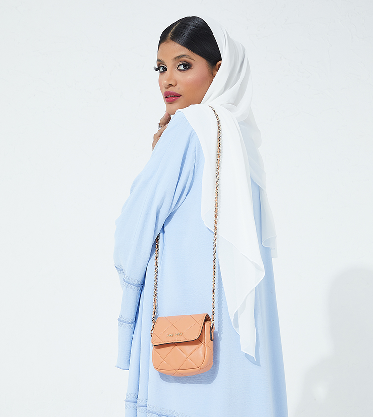 Crescent Mini Quilted Crossbody Bag