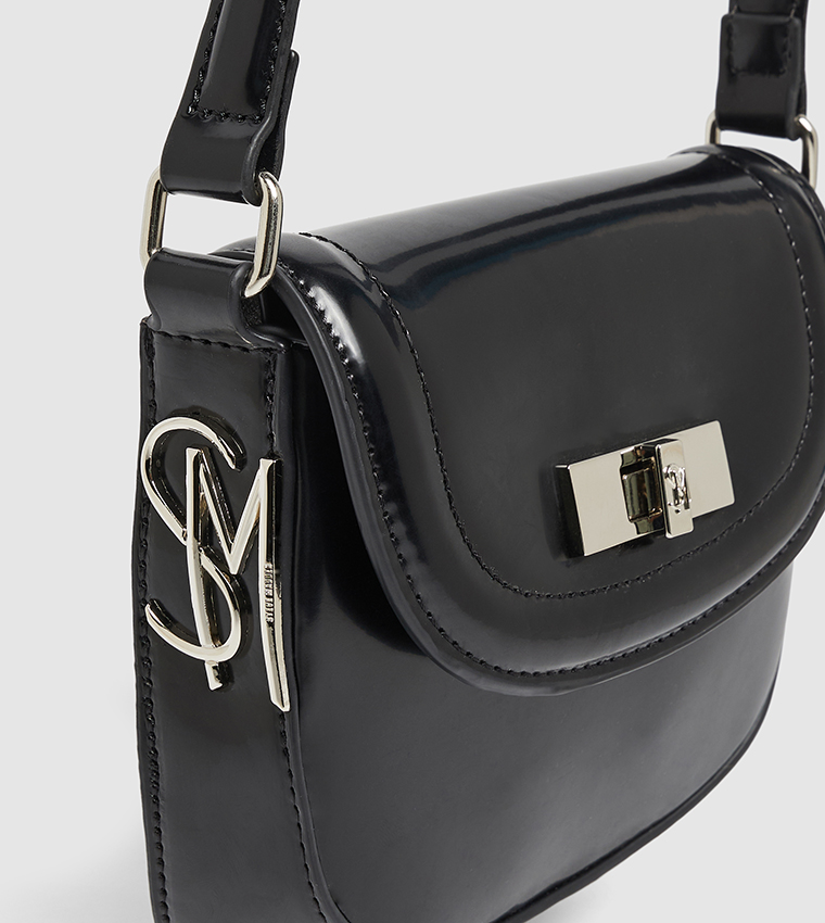 شنطة كتف سادة بقفل لف