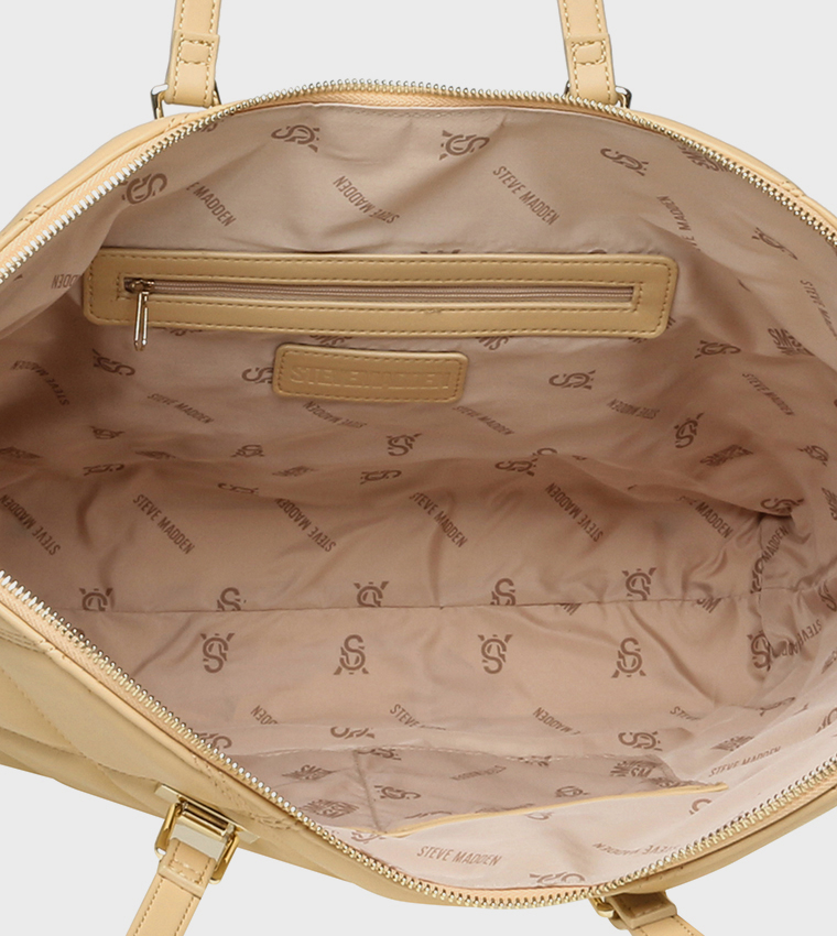 شنطة توت مبطنة بشعار 