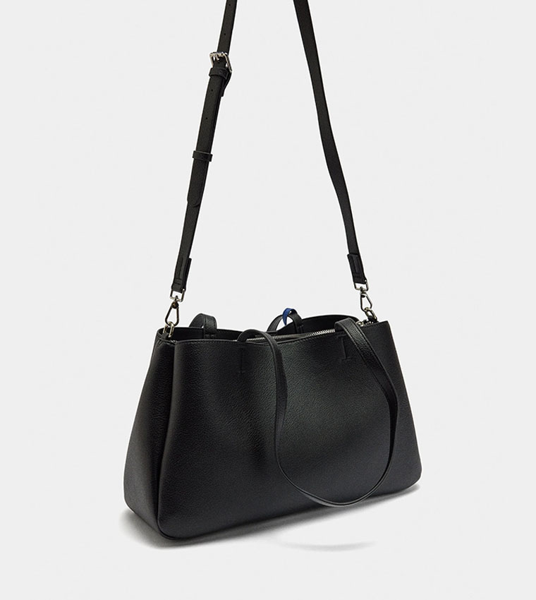 شنطة كتف بتفاصيل تعليقة