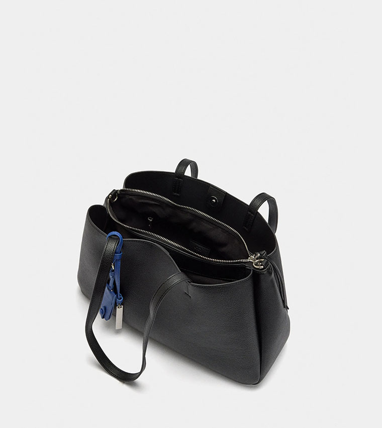 شنطة كتف بتفاصيل تعليقة