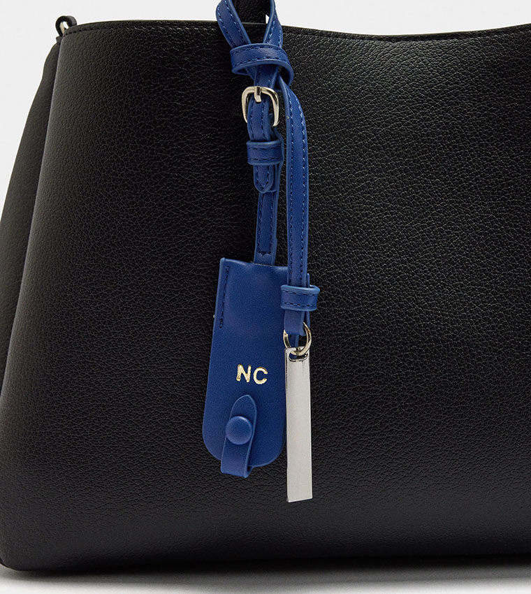 شنطة كتف بتفاصيل تعليقة