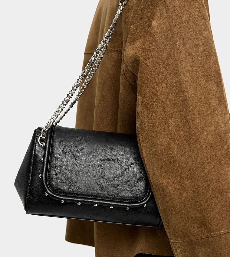 شنطة كتف بغطاء مزينة