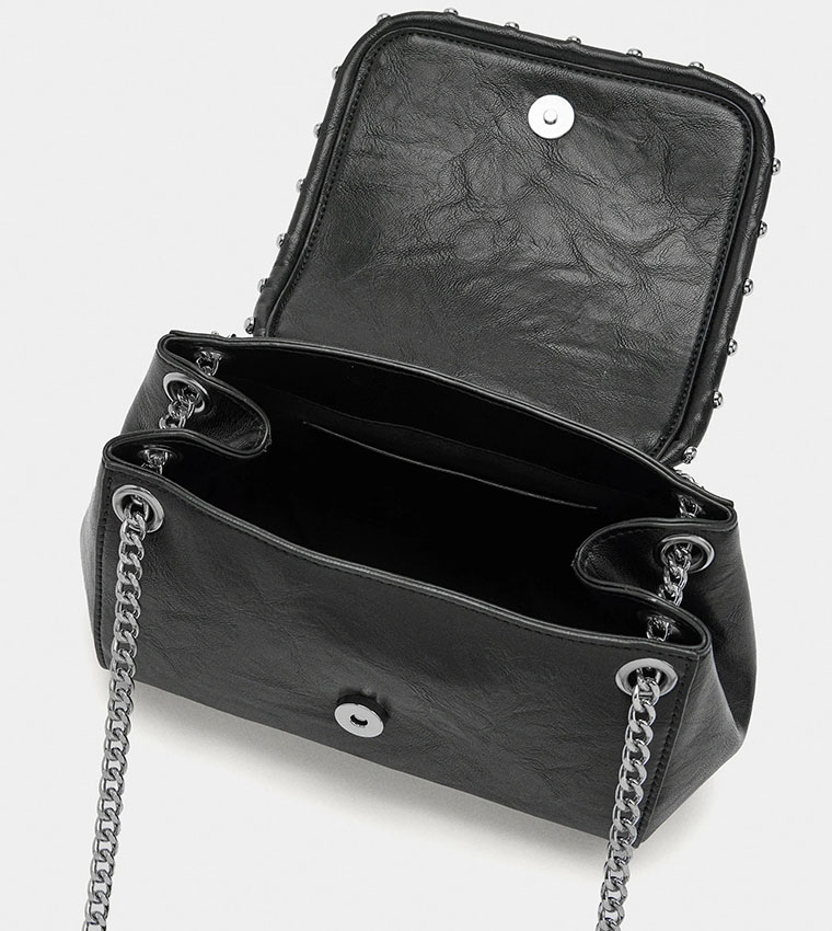 شنطة كتف بغطاء مزينة