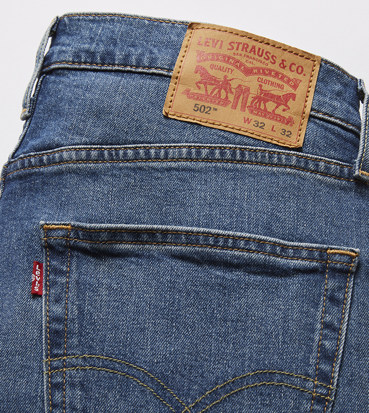 502™ Mid Tapered Jeans