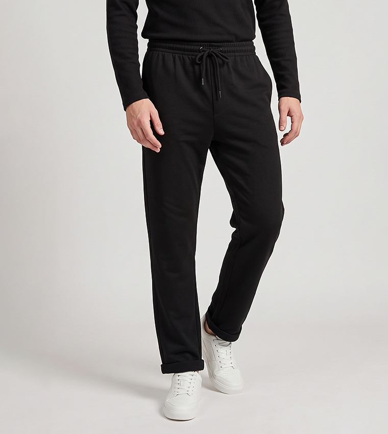 Solid Knit Trousers with Button Closure