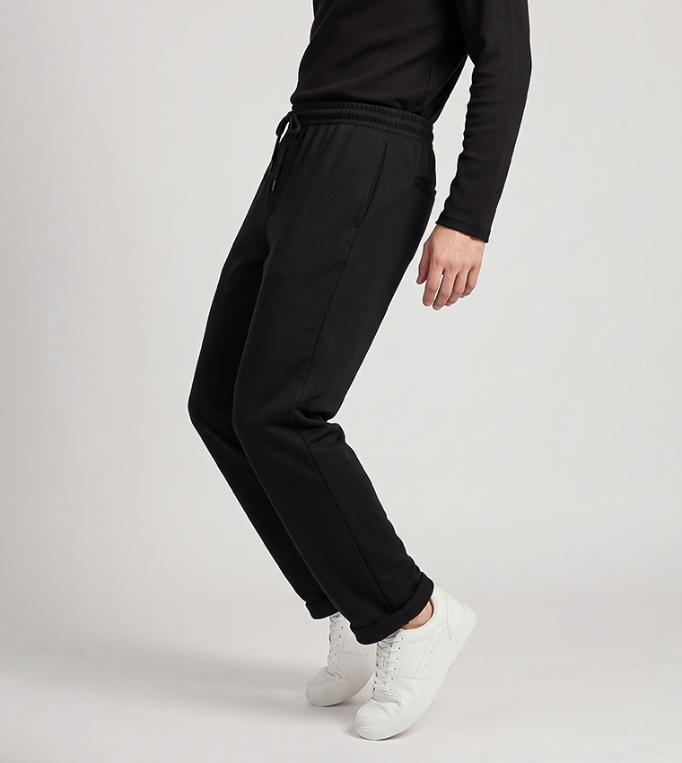 Solid Knit Trousers with Button Closure
