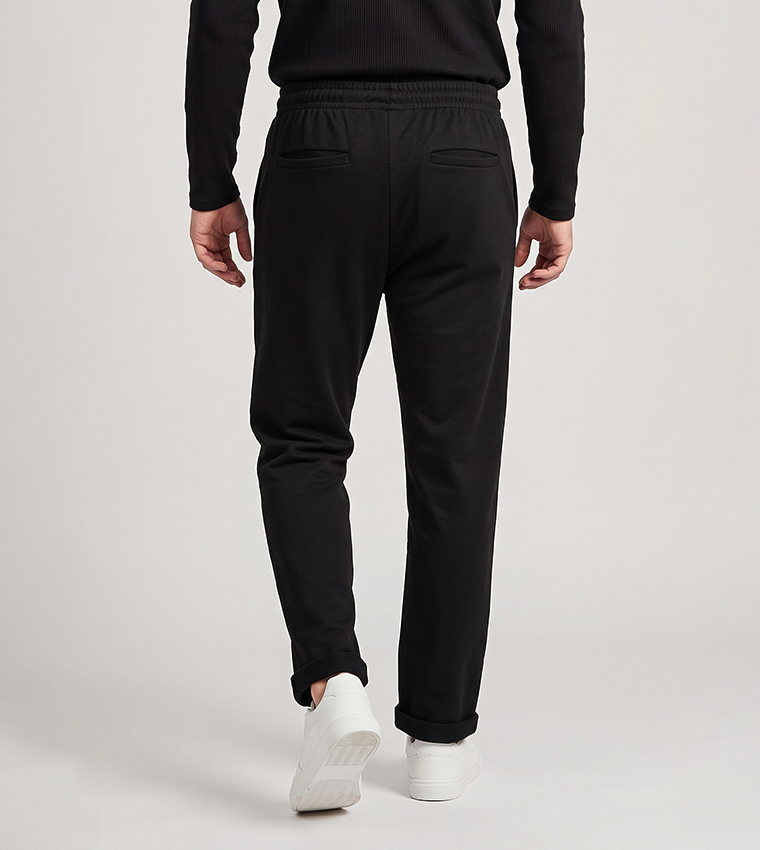 Solid Knit Trousers with Button Closure