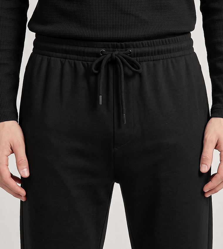 Solid Knit Trousers with Button Closure