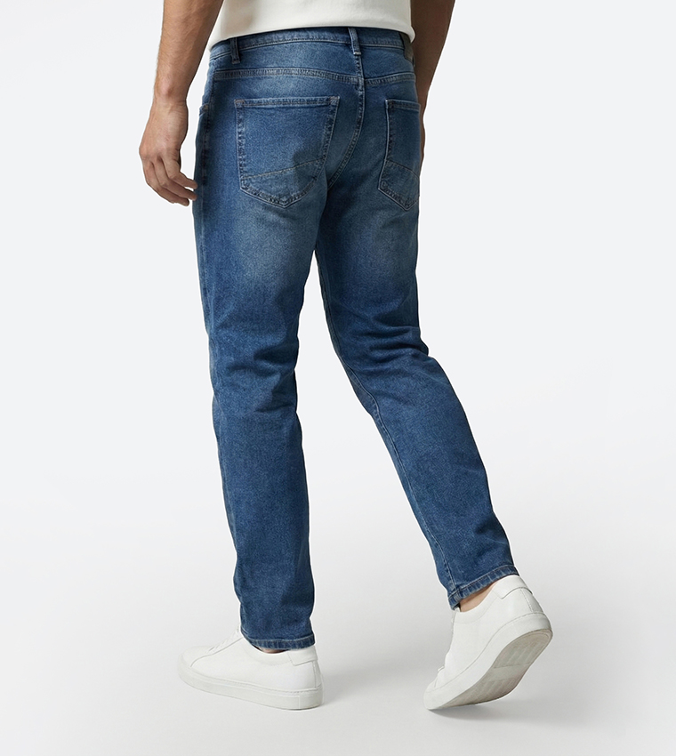 بنطلون جينز ضيق بخصر متوسط