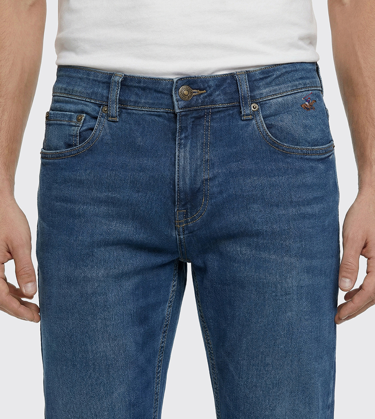 بنطلون جينز ضيق بخصر متوسط