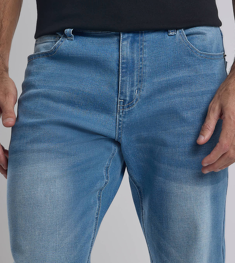 Faded Tapered Fit Jeans with Button Closure
