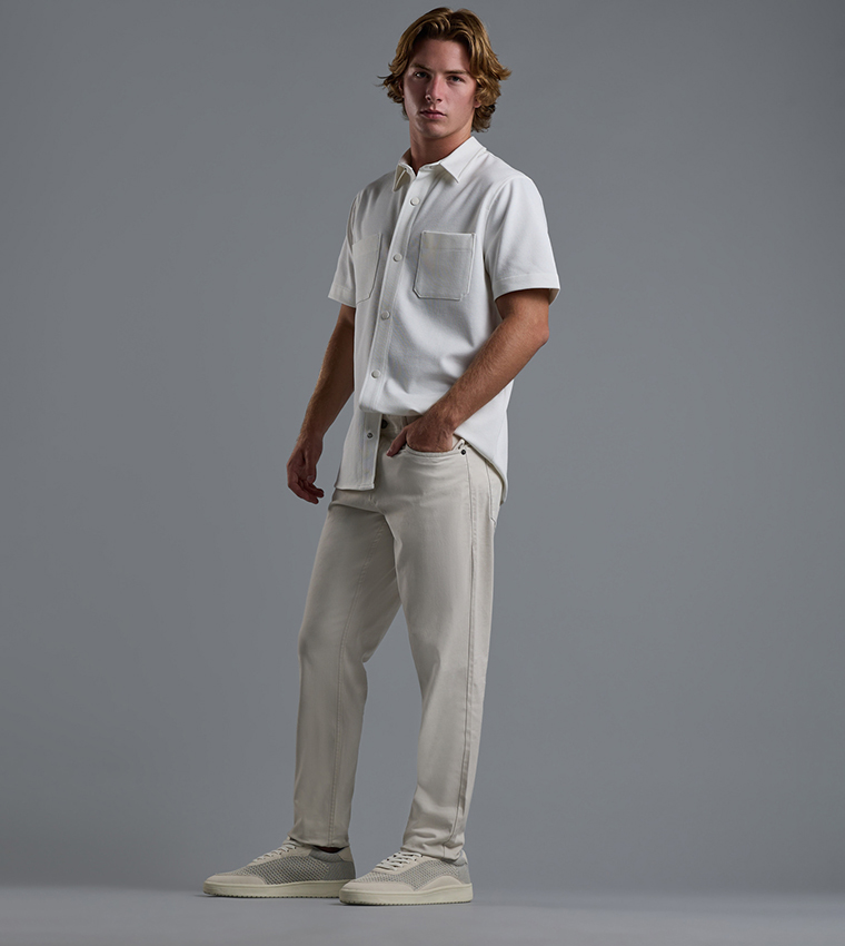 بنطال منسوج سادة بأزرار