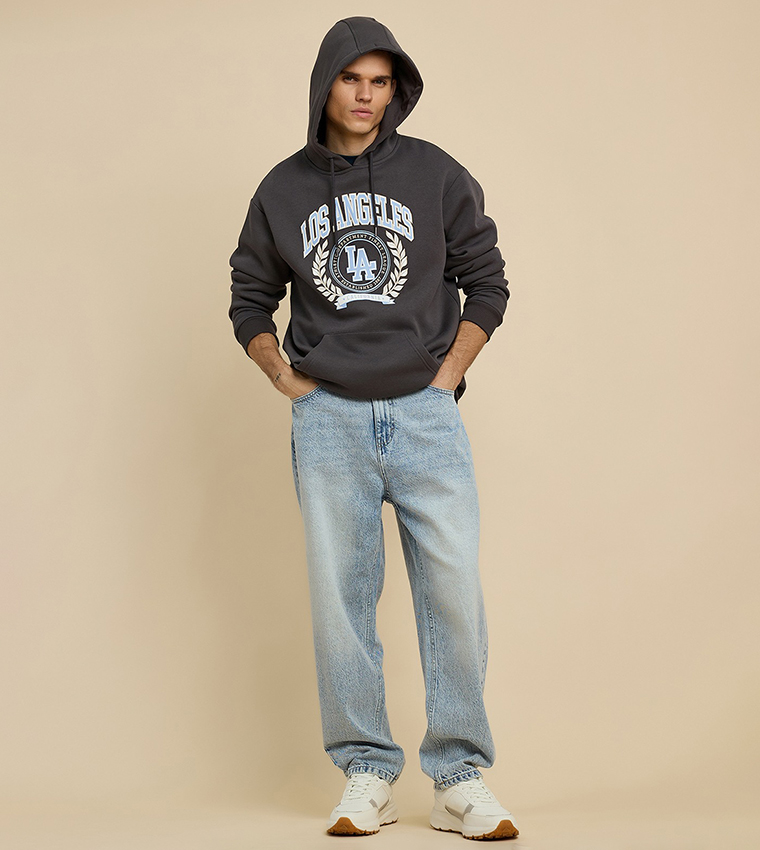 Washed Relaxed Fit Jeans with Button Closure