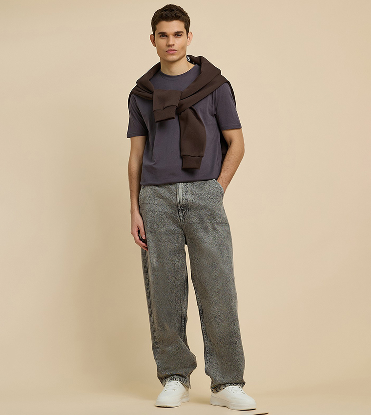 Washed Skater Jeans with Button Closure