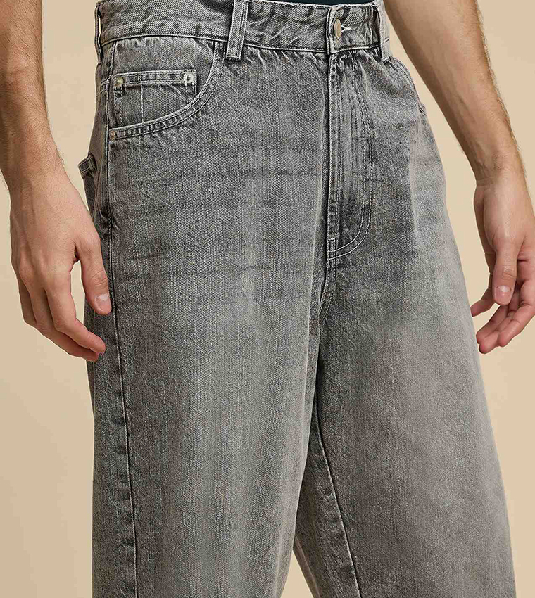 Faded Baggy Jeans with Button Closure