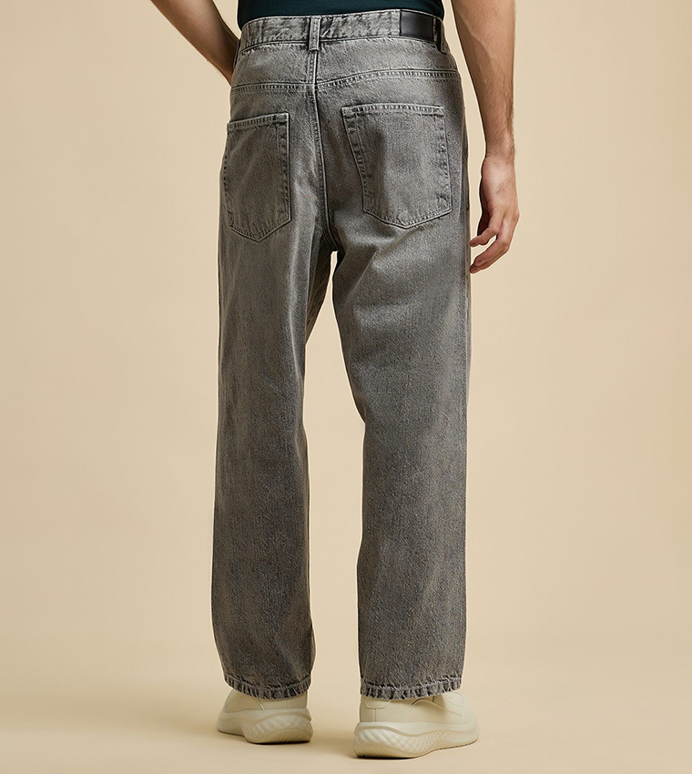 Faded Baggy Jeans with Button Closure