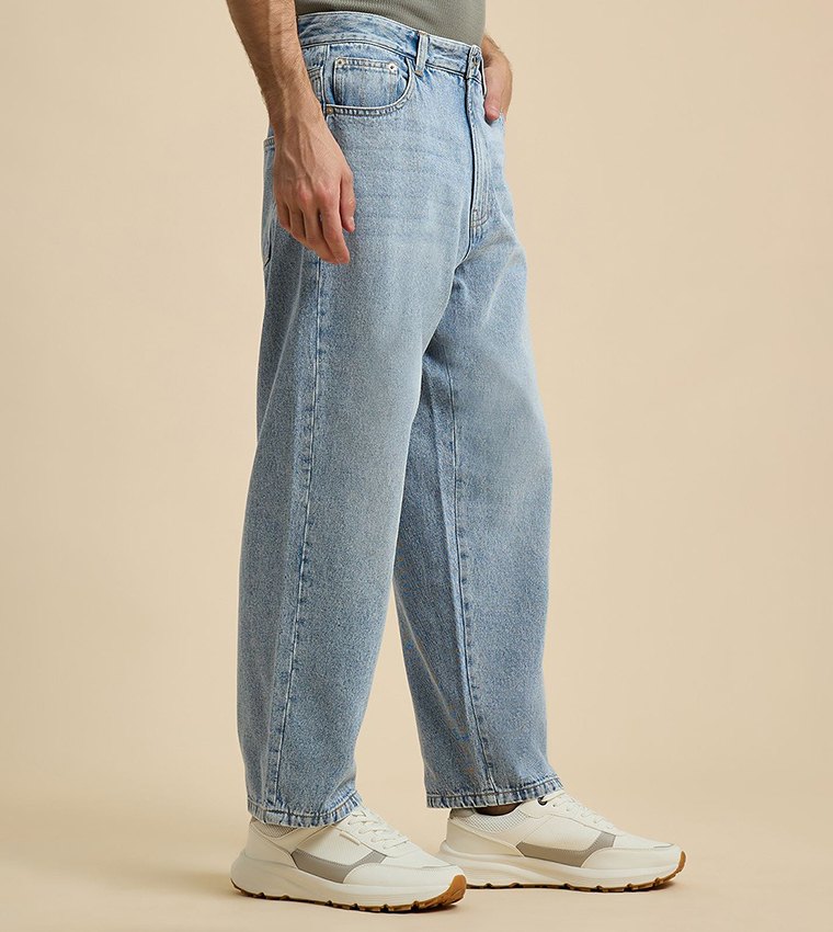 Faded Baggy Jeans with Button Closure