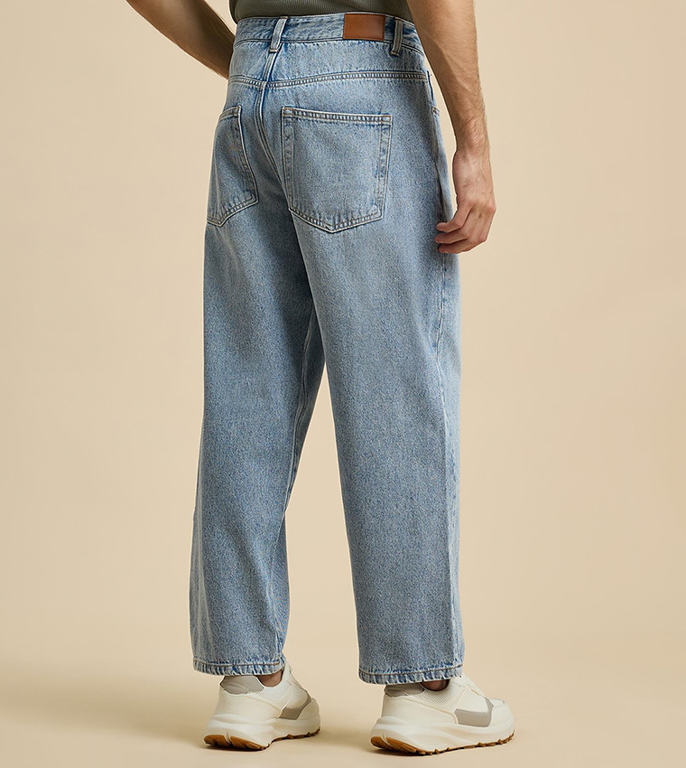 Faded Baggy Jeans with Button Closure