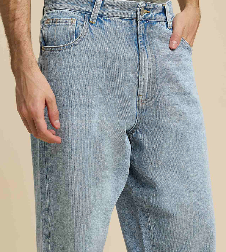 Faded Baggy Jeans with Button Closure