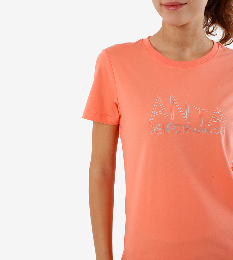 تي شيرت بأكمام قصيرة لون برتقالي