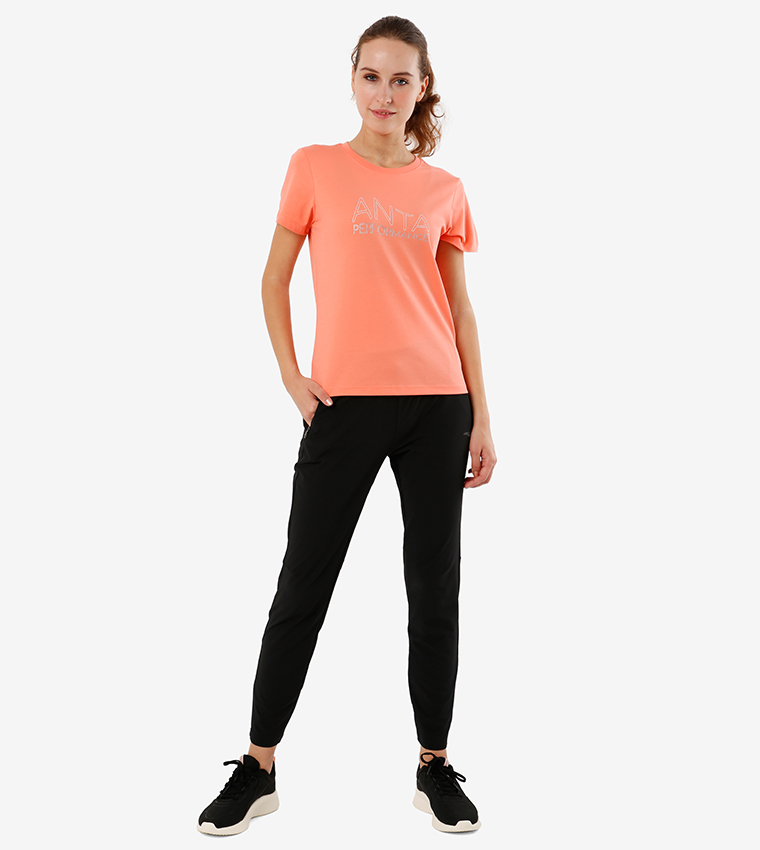 تي شيرت بأكمام قصيرة لون برتقالي