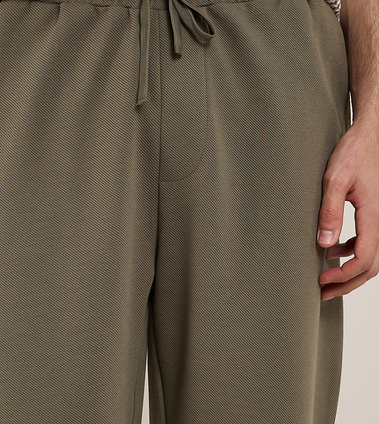 Solid Relaxed Fit Pants with Drawstring Waist