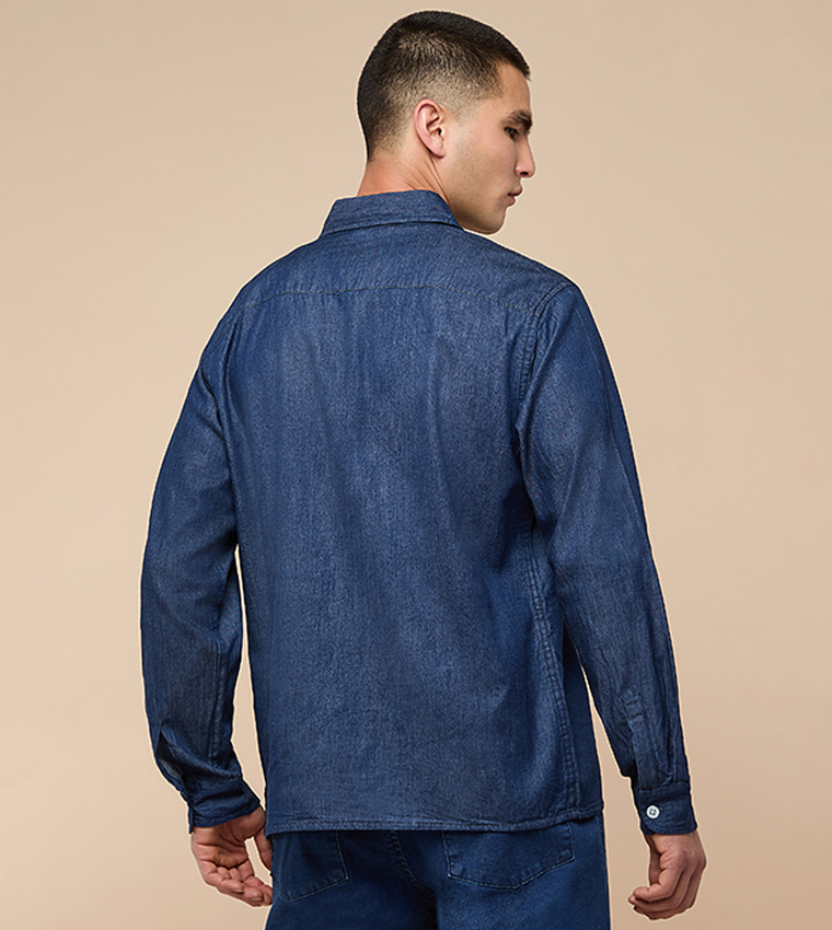 قميص دنيم مغسول كم طويل