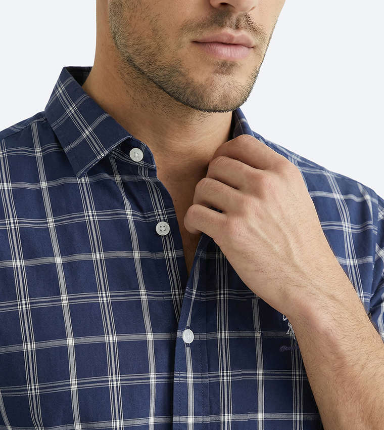 قميص كاروهات كم طويل