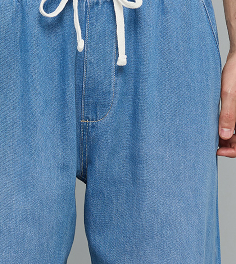 Washed Relaxed Fit Jeans with Button Closure