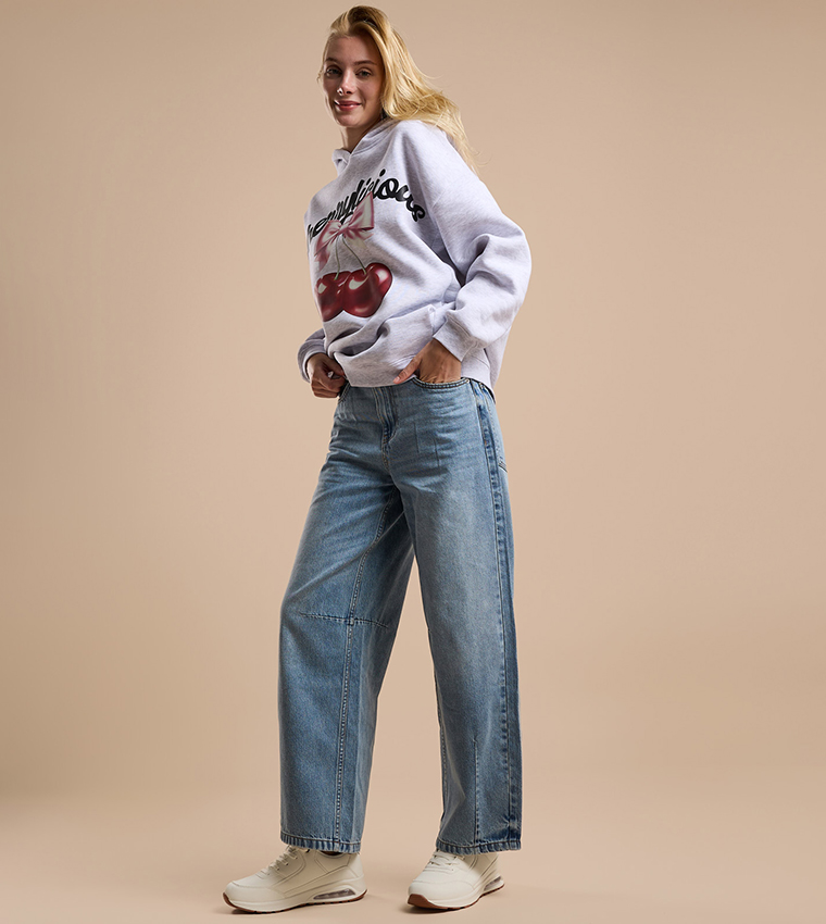 Faded Baggy Jeans with Button Closure
