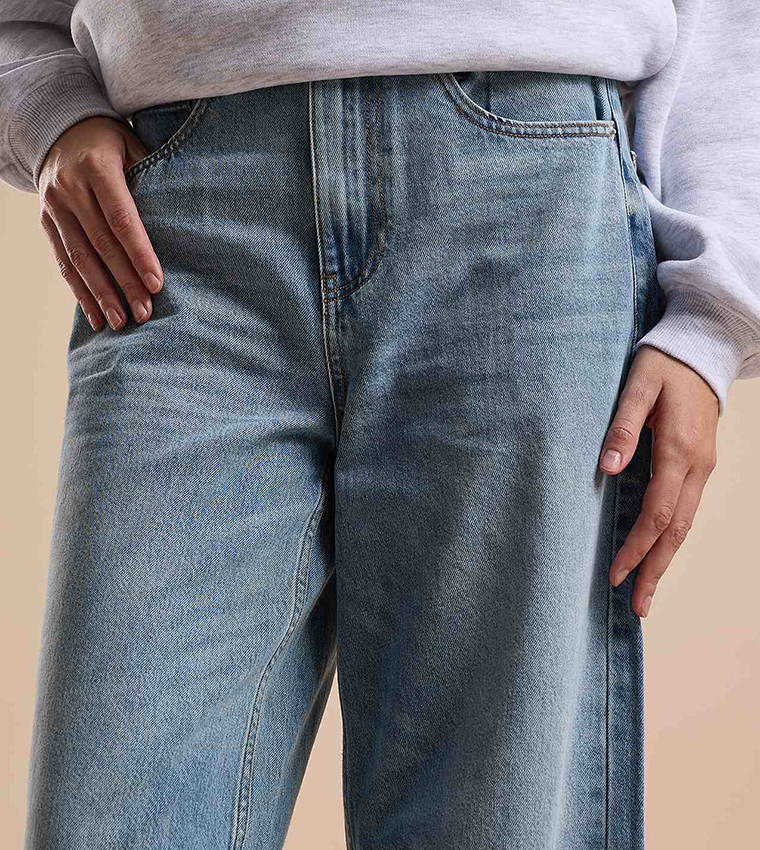 Faded Baggy Jeans with Button Closure