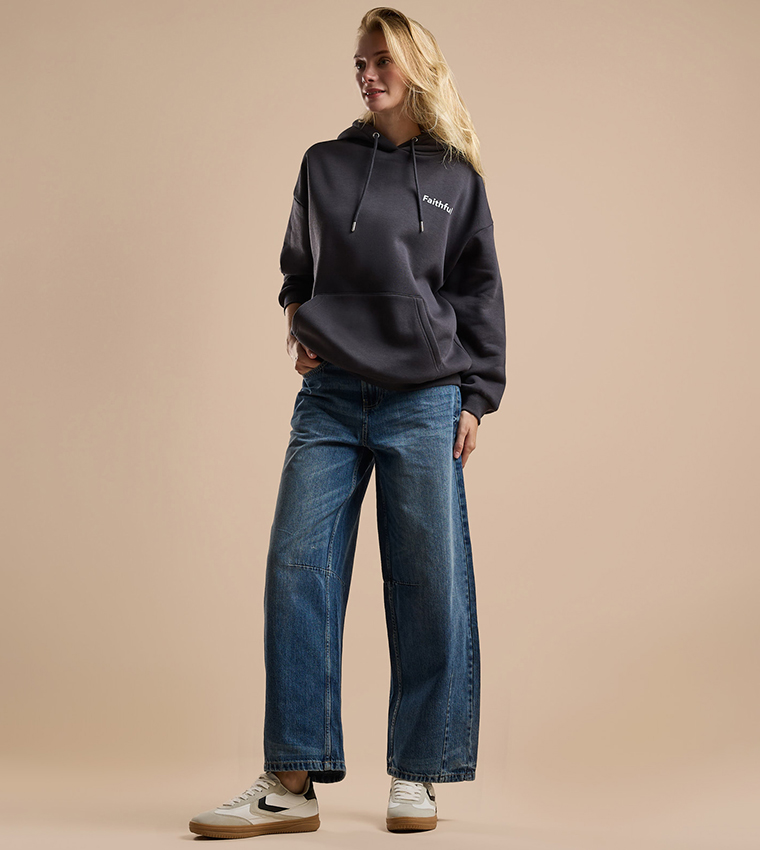 Faded Baggy Jeans with Button Closure