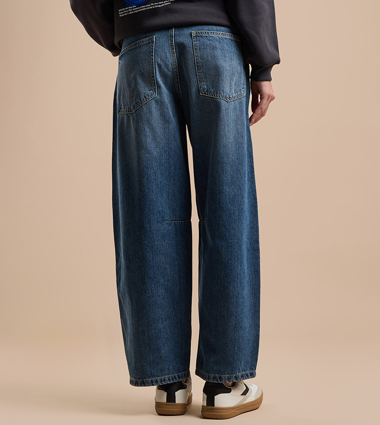 Faded Baggy Jeans with Button Closure