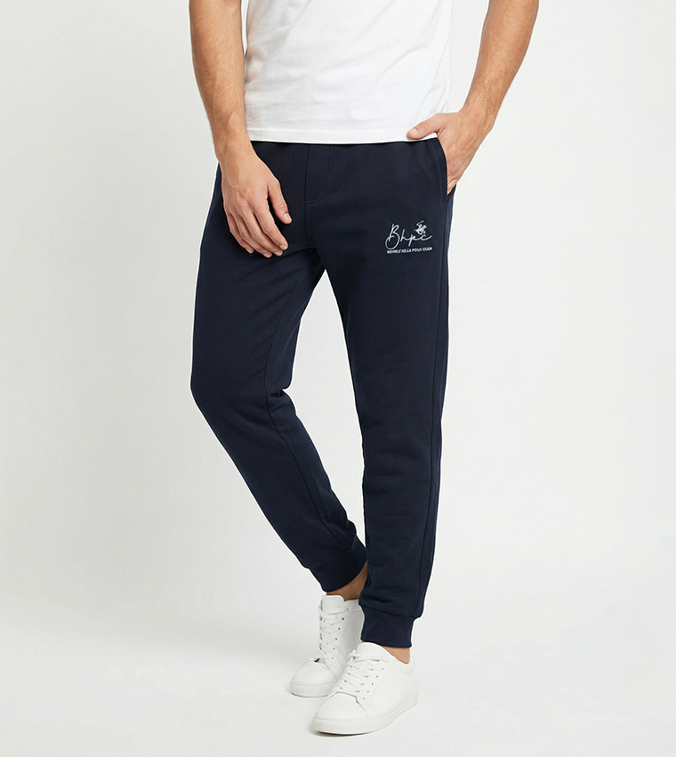 بنطلون رياضة بخصر مرن بشعار