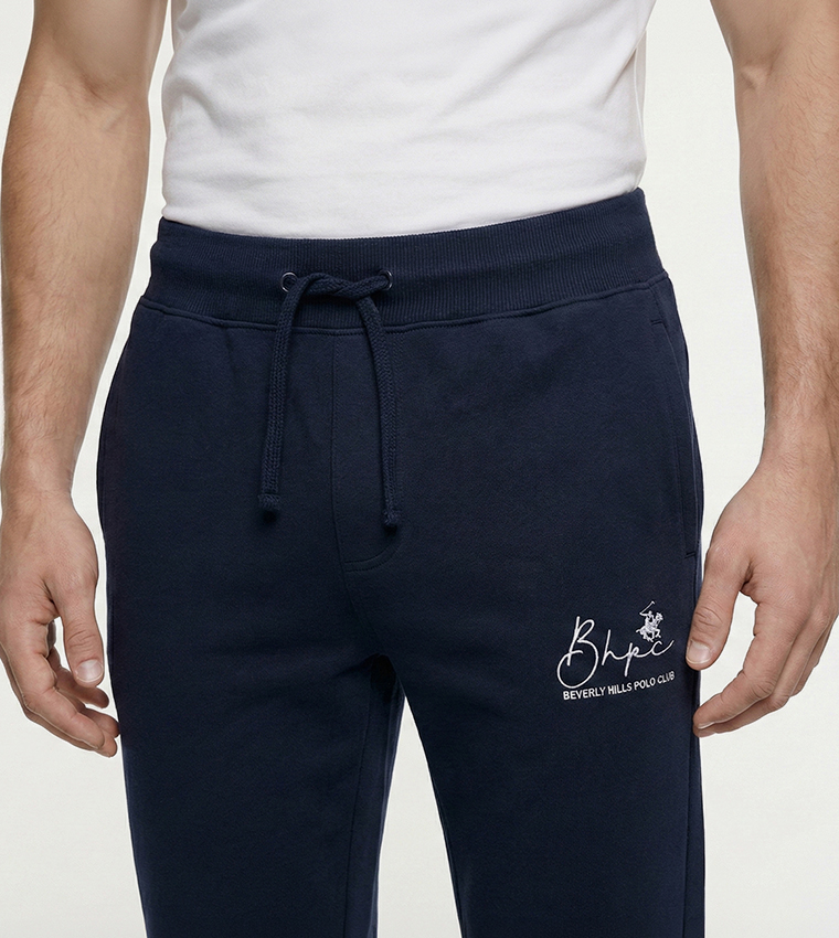 بنطلون رياضة بخصر مرن بشعار