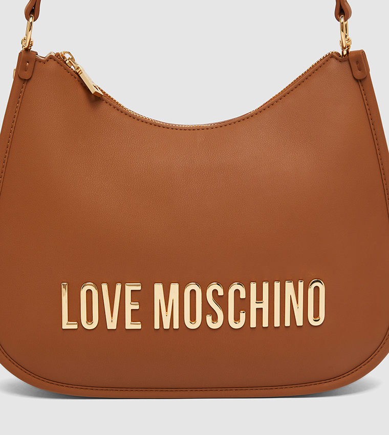 شنطة كتف بشعار