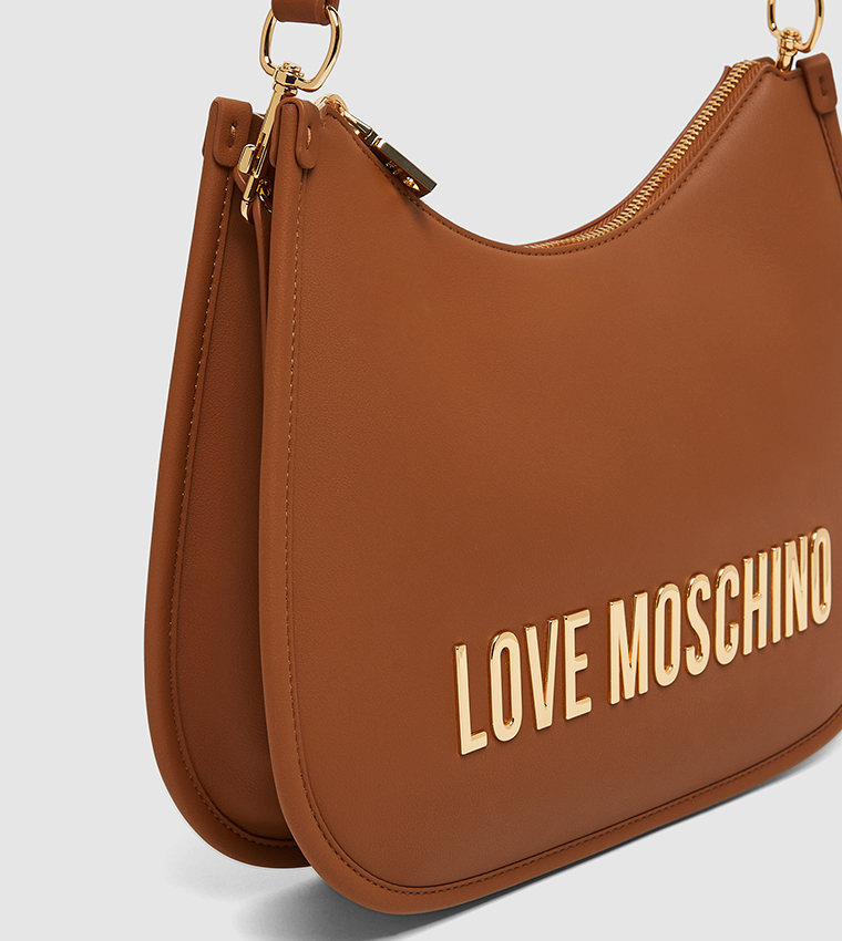 شنطة كتف بشعار