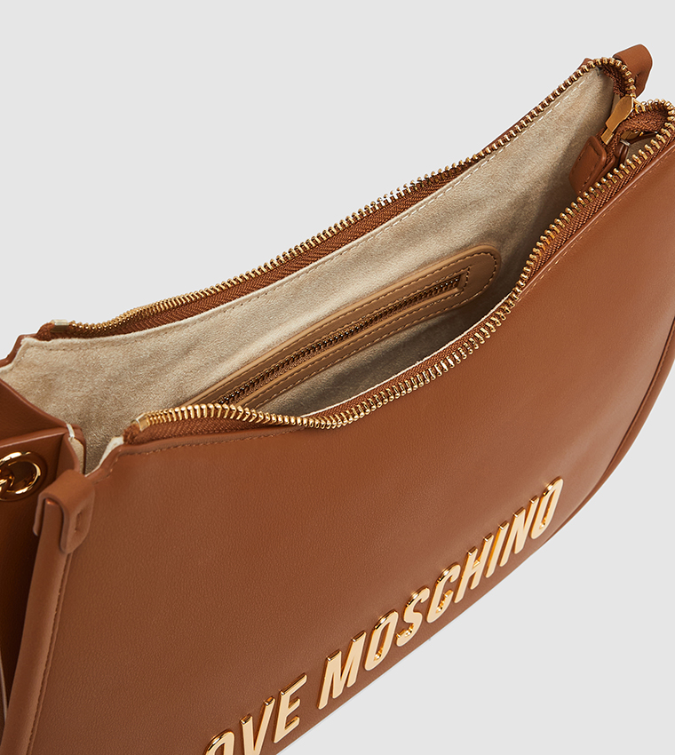 شنطة كتف بشعار