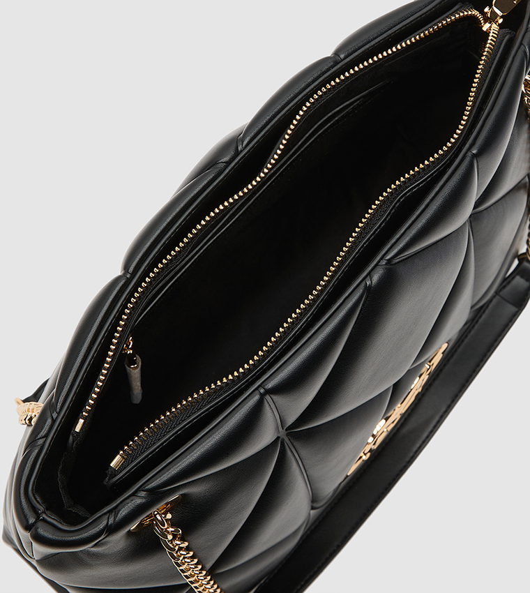 شنطة كتف مبطنة بشعار