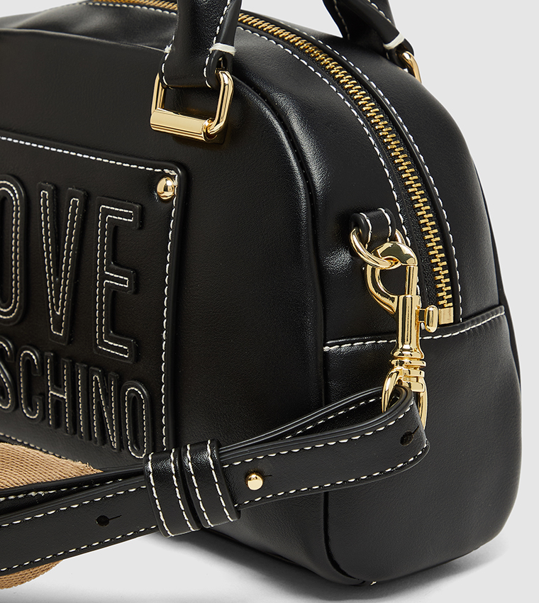 شنطة يد بشعار