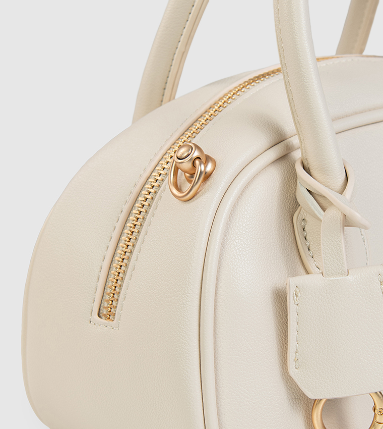 شنطة ساتشل بنقشة وتعليقة 