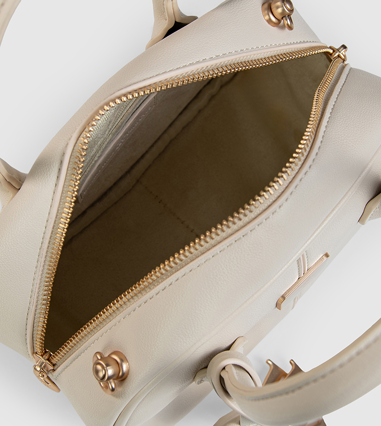 شنطة ساتشل بنقشة وتعليقة 